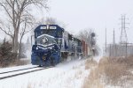 Nearing their destination, 6355 & 6303 roll down the main